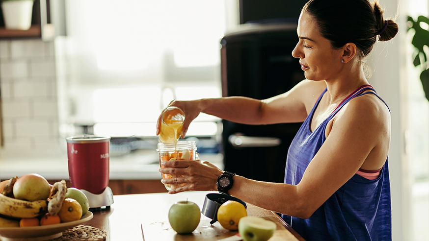 Woman making smoothie